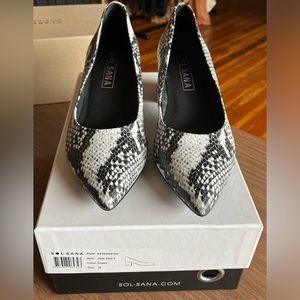 Never been worn. Snake block heel